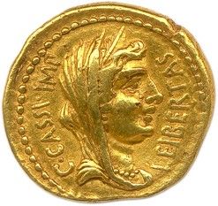 une pièce d'or à l'effigie d'un homme portant une coiffe