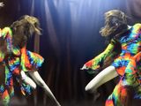 two mannequins dressed in brightly colored clothing
