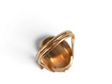 an image of a gold ring on a white surface with a white background