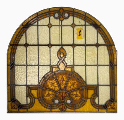 an image of a stained glass window with a clock on it