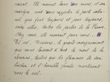an old book with a handwritten letter on it