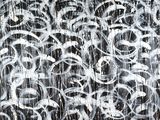 a black and white painting of a bunch of rings