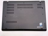 a close up of a laptop on a white surface