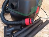 a close up of a blow dryer on a wooden surface