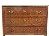 a wooden chest of drawers with brass handles and drawers