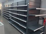 many empty shelves in a store with a lot of empty items
