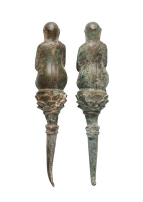 paire de figurines en bronze représentant un homme et une femme