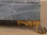 a marble box on the ground on the floor