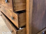 an image of a wooden dresser with two drawers on top of it