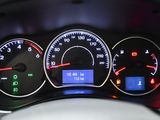 a close up of a car dashboard with various gauges
