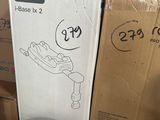 a box with a drawing of a person on it next to a toilet
