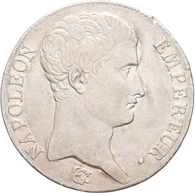 a close up of a coin with a woman ' s face on it