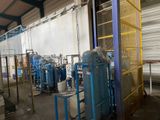 a large room with a lot of machines in it