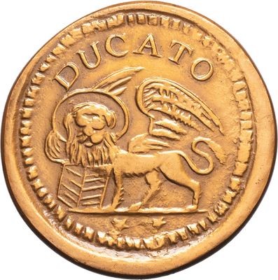 a close up of a gold coin with a lion on it