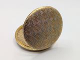 an image of a close up of a gold pocket watch on a white surface