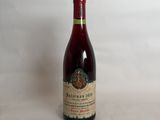 a bottle of wine that is sitting on a table
