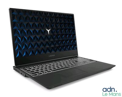 un ordinateur portable noir avec un motif bleu sur l'écran