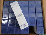 a box of blue boxes with a white box on top