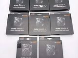 six boxed boxes of camera equipment sitting on a white surface