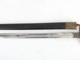 an image of a knife and a pen on a white surface