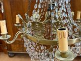 a chandelier that is hanging from the ceiling