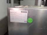 an image of a silver refrigerator in a kitchen