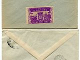 a close up of two envelopes with stamps on them