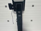 an image of a television stand in a garage