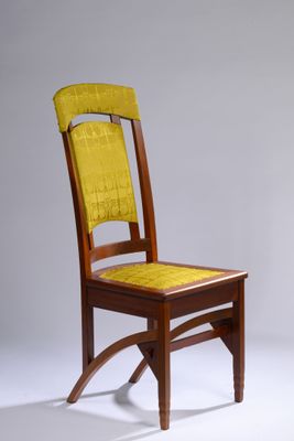 chair made of solid wood with a yellow upholstered seat