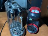 a coffee machine and a coffee cup on a table