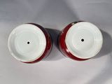 pair of red and white porcelain salt and pepper shakers