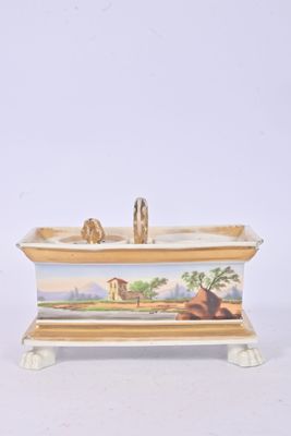 a bathtub with a painting on the side of it
