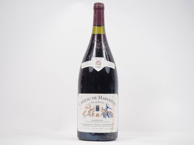bottle of red wine on a white table with a white background