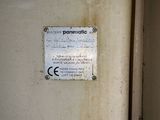 a sign on the door of a building that says panamitic