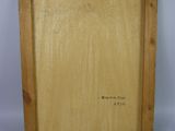 a painting of a wooden frame with writing on it