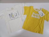 two t - shirts that are on a white table