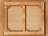 an old picture of a wooden frame with a picture on it