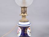 an image of a lamp with a glass shade on it