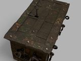 an old wooden box with a lock on top of it