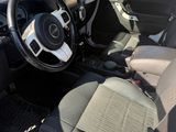 the interior of a car with a steering wheel and a dashboard