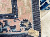 an image of a close up of a rug on a floor