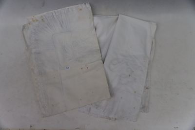 two pieces of paper that have been left on the table