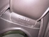 a close up view of a toilet with the seat up