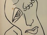 l'image d'un dessin d'un visage d'homme sur une feuille de papier