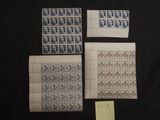 four stamps and a postcard on a black background