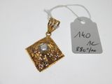 une photo d'un pendentif en or orné d'un diamant