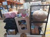 a cart with a lot of items on it in a warehouse