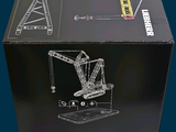 a black box with a drawing of a crane on it