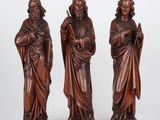 three carved wood figures of jesus and mary