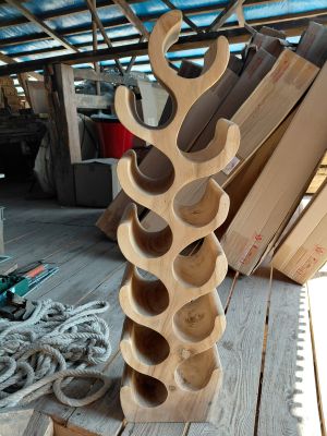 a picture of a wine rack made out of wine bottles